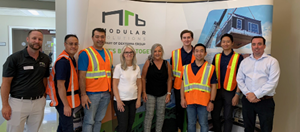 oecm staff posing with NRB modular staff